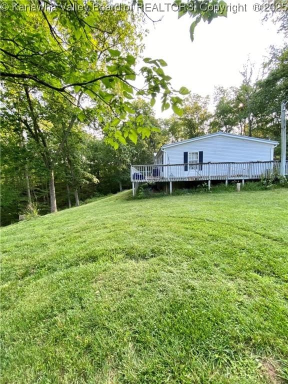 2399 Spicewood Rd, Kenna, WV 25248 - view of grassy yard with a wooden deck