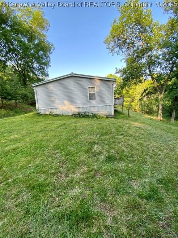 2399 Spicewood Rd, Kenna, WV 25248 - view of home's exterior with a yard