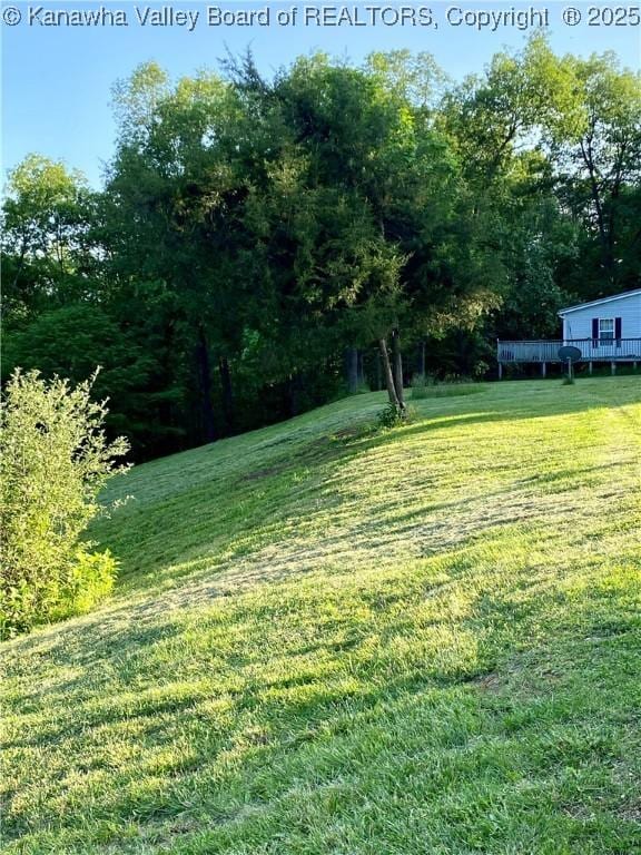 2399 Spicewood Rd, Kenna, WV 25248 - view of grassy yard with a wooden deck