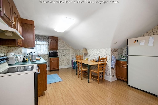 1598 Kanawha Blvd E, Charleston, WV 25311 - kitchen featuring wallpapered walls, white appliances, vaulted ceiling, light wood-style floors, and under cabinet range hood