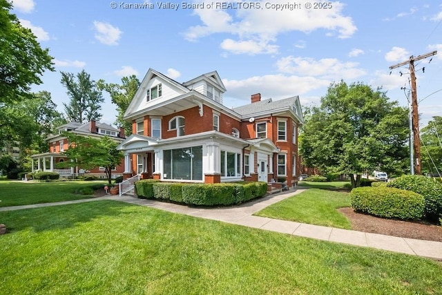 1598 Kanawha Blvd E, Charleston, WV 25311 - view of front of home featuring brick siding, a front yard, and a chimney