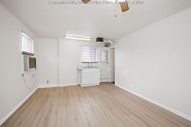 1598 Kanawha Blvd E, Charleston, WV 25311 - unfurnished living room with light wood finished floors, healthy amount of natural light, and a ceiling fan