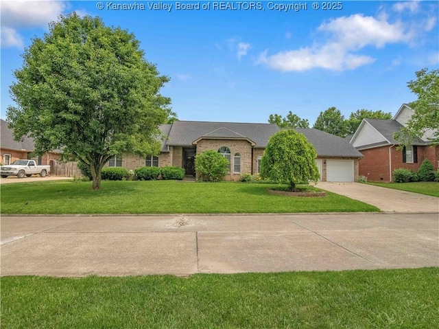 3710 Cambridge Cir, Hurricane, WV 25526 - view of front of property with driveway, a front yard, and brick siding