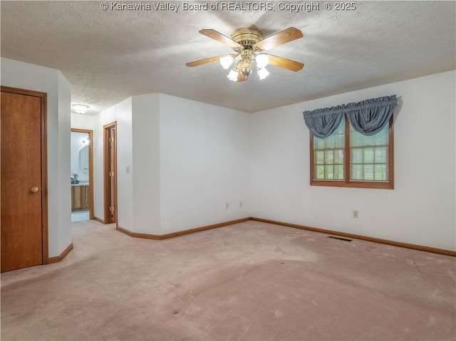 3710 Cambridge Cir, Hurricane, WV 25526 - carpeted empty room featuring a textured ceiling and a ceiling fan