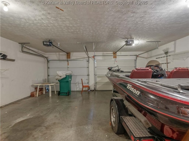 3710 Cambridge Cir, Hurricane, WV 25526 - garage featuring a garage door opener