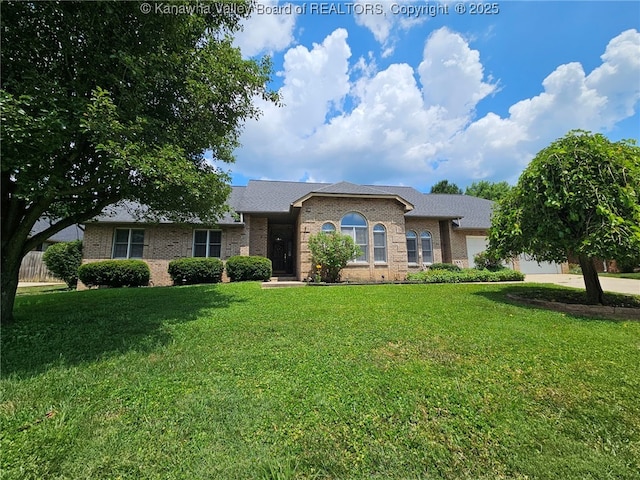 3710 Cambridge Cir, Hurricane, WV 25526 - single story home with brick siding, an attached garage, a front yard, and a shingled roof