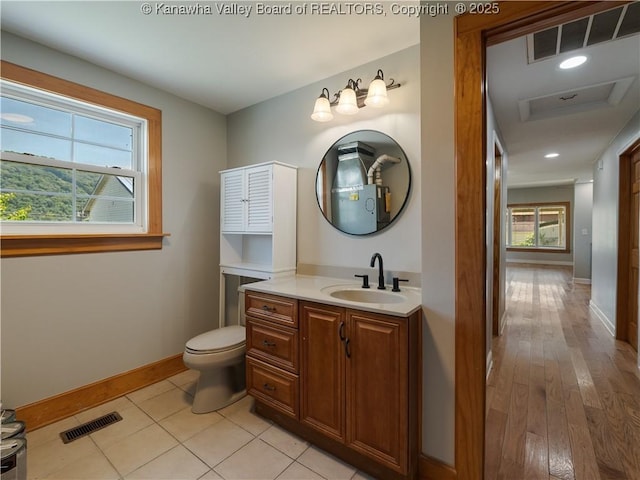 9012 Florida Ave, Marmet, WV 25315 - bathroom featuring vanity and wood finished floors