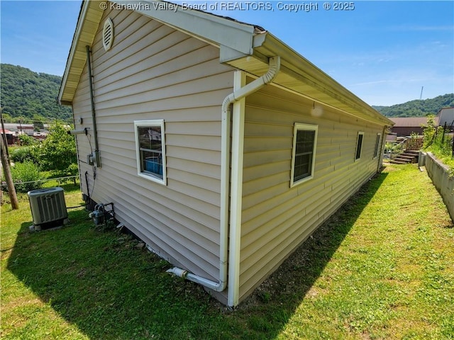 9012 Florida Ave, Marmet, WV 25315 - view of home's exterior featuring a central air condition unit and a mountain view