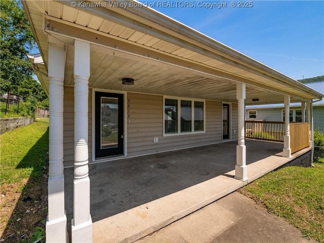 9012 Florida Ave, Marmet, WV 25315 - covered porch with a yard