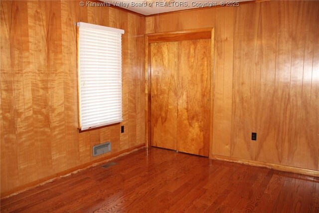 401 Green Acres Dr, Hurricane, WV 25526 - spare room with wooden walls and wood finished floors