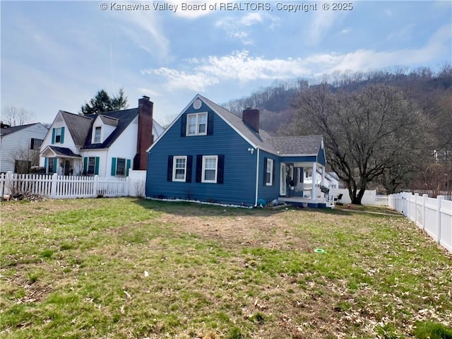 602 43rd St SE, Charleston, WV 25304 - rear view of house featuring a chimney and a fenced backyard