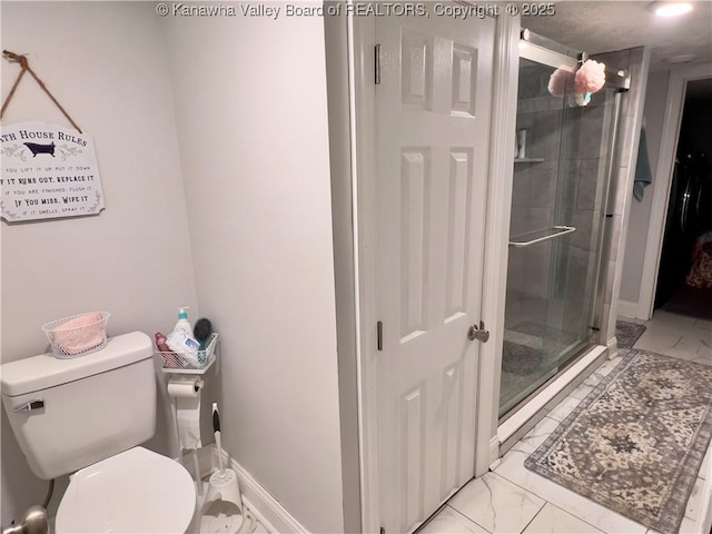 602 43rd St SE, Charleston, WV 25304 - bathroom with marble finish floors, a shower stall, and a closet