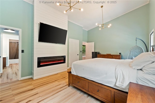 815 Chappell Rd, Charleston, WV 25304 - bedroom with a chandelier, high vaulted ceiling, ornamental molding, light wood-type flooring, and a fireplace