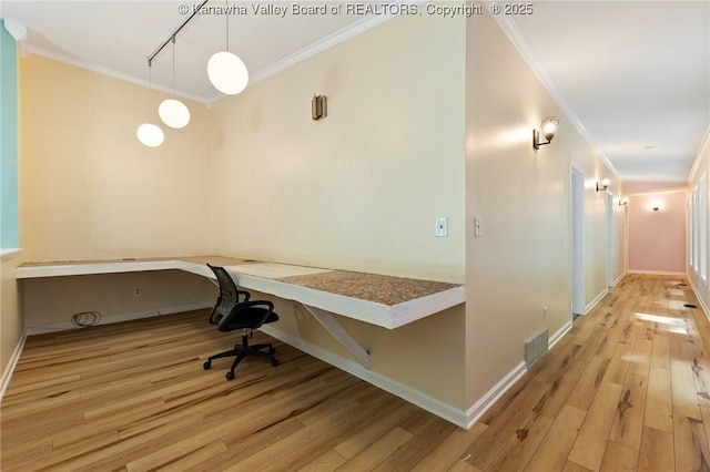 815 Chappell Rd, Charleston, WV 25304 - unfurnished office with crown molding, light wood-style floors, track lighting, and built in study area