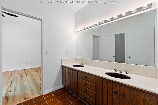 815 Chappell Rd, Charleston, WV 25304 - bathroom featuring double vanity and baseboards