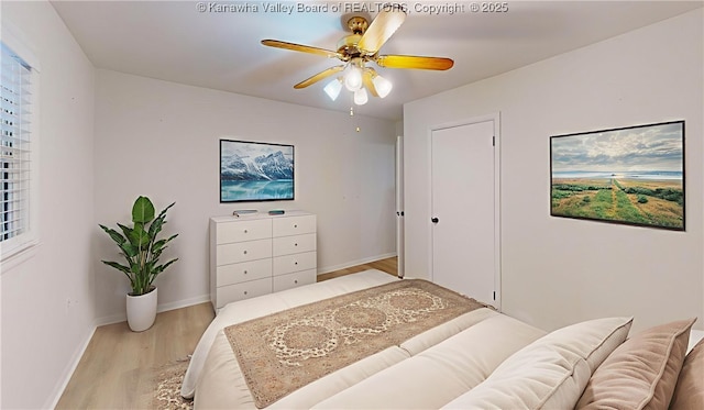 5490 Fisher Bowen Branch Rd, Wayne, WV 25570 - bedroom with light wood finished floors and ceiling fan