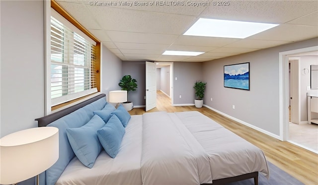 5490 Fisher Bowen Branch Rd, Wayne, WV 25570 - bedroom featuring light wood-style flooring and a paneled ceiling