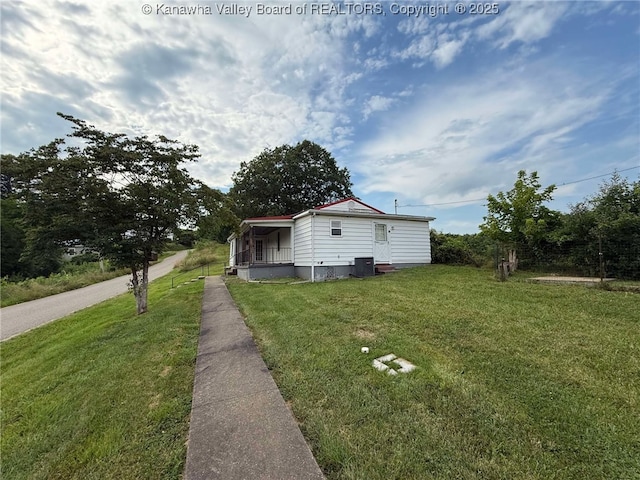 4303 Thomas Ridge Rd, Leon, WV 25123 - view of side of home featuring a yard and a central air condition unit