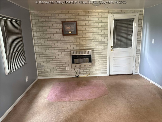 4303 Thomas Ridge Rd, Leon, WV 25123 - unfurnished living room featuring heating unit and carpet