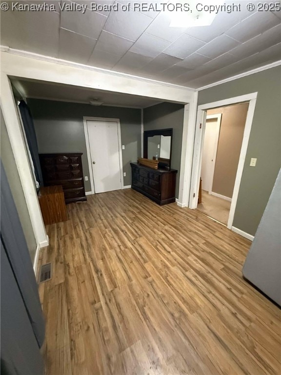 4303 Thomas Ridge Rd, Leon, WV 25123 - unfurnished living room with wood finished floors and baseboards