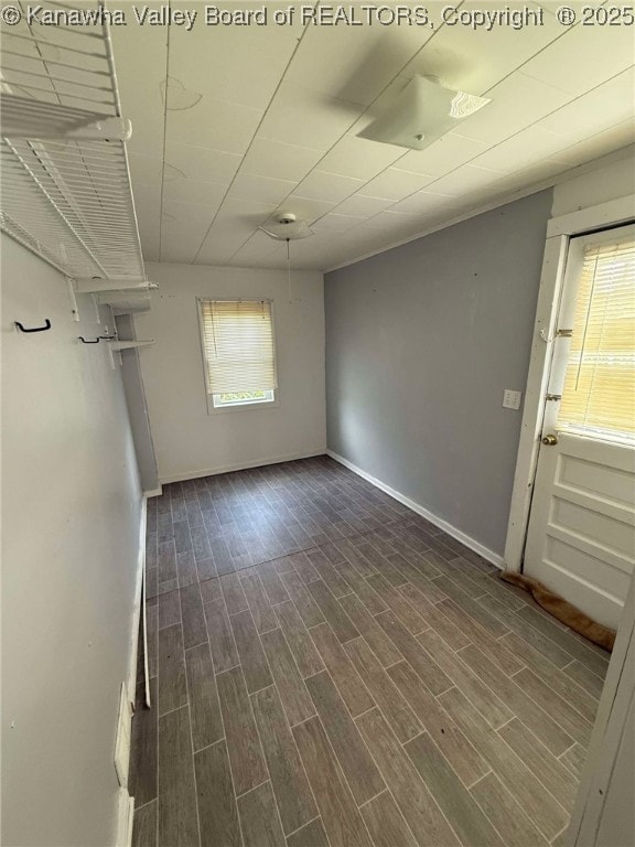 4303 Thomas Ridge Rd, Leon, WV 25123 - spare room featuring dark wood finished floors and baseboards