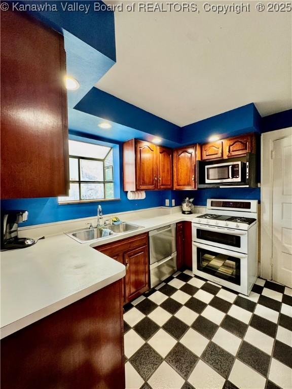 406 Elm St, Charleston, WV 25302 - kitchen with stainless steel appliances, light countertops, and light floors