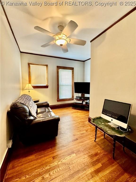 406 Elm St, Charleston, WV 25302 - living room featuring wood finished floors, crown molding, and ceiling fan