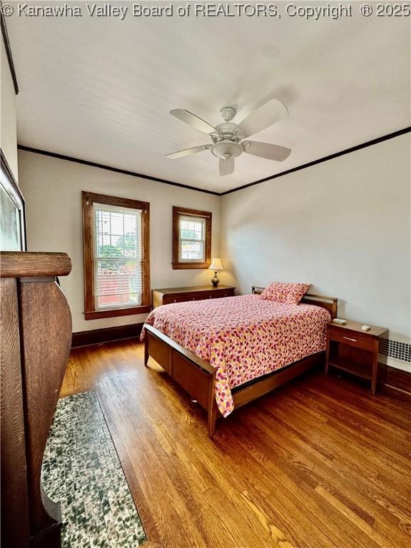 406 Elm St, Charleston, WV 25302 - bedroom with wood finished floors and ceiling fan