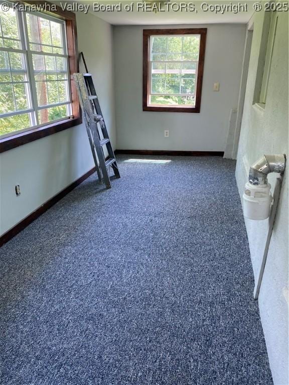 42 Pine Cone Rd, Elkview, WV 25071 - spare room with baseboards and speckled floor