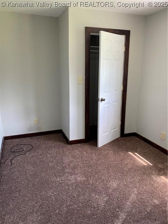 42 Pine Cone Rd, Elkview, WV 25071 - spare room with baseboards and carpet