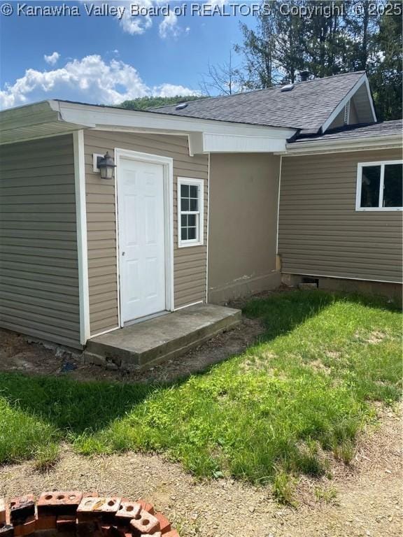 42 Pine Cone Rd, Elkview, WV 25071 - property entrance with a shingled roof and a lawn