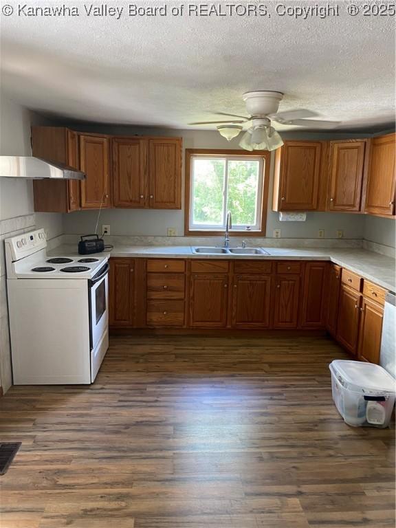 42 Pine Cone Rd, Elkview, WV 25071 - kitchen featuring electric stove, a textured ceiling, dark wood-style flooring, ceiling fan, and light countertops