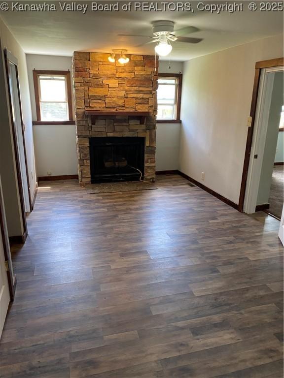 42 Pine Cone Rd, Elkview, WV 25071 - unfurnished living room featuring a ceiling fan, a fireplace, and wood finished floors