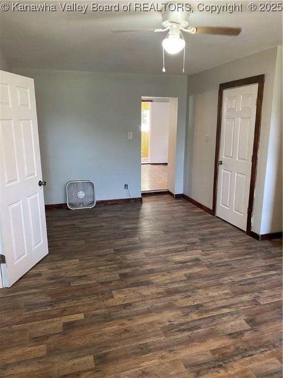 42 Pine Cone Rd, Elkview, WV 25071 - unfurnished bedroom featuring dark wood finished floors and a ceiling fan