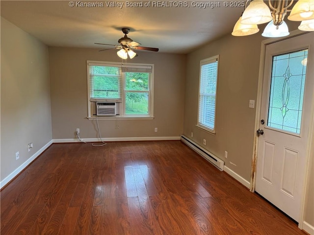 913 Charleston Rd, Point Pleasant, WV 25550 - foyer entrance with a baseboard radiator, cooling unit, dark wood-style flooring, ceiling fan, and a chandelier