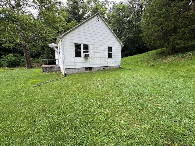 913 Charleston Rd, Point Pleasant, WV 25550 - view of property exterior featuring a lawn and cooling unit