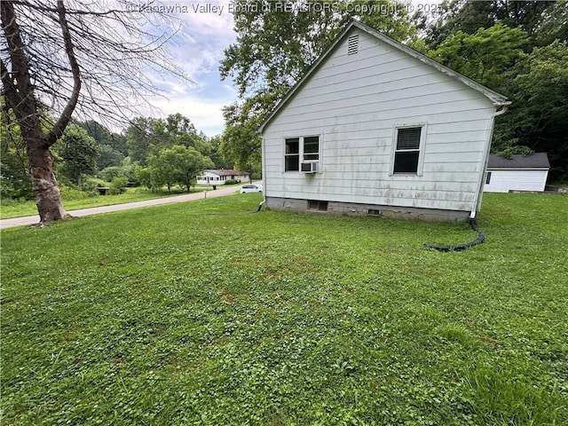 913 Charleston Rd, Point Pleasant, WV 25550 - view of property exterior with a lawn and cooling unit