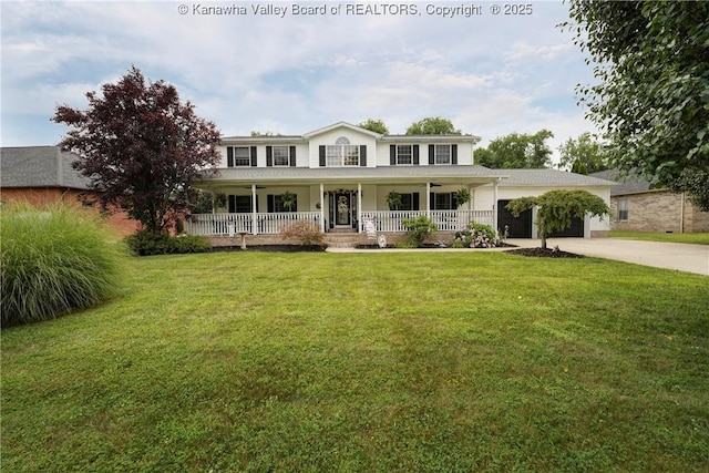 8 Anchors Way, Winfield, WV 25213 - view of front of property with covered porch, an attached garage, driveway, and a front yard