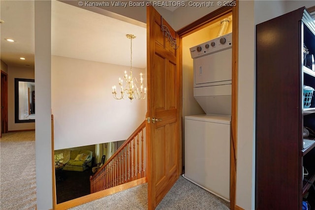 8 Anchors Way, Winfield, WV 25213 - laundry room featuring stacked washer / drying machine, carpet flooring, a chandelier, and recessed lighting