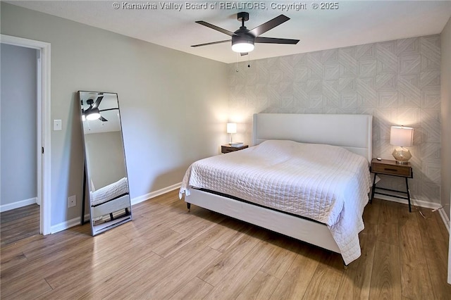 5301 Balsam Cir, Charleston, WV 25313 - bedroom with wood finished floors, wallpapered walls, and ceiling fan