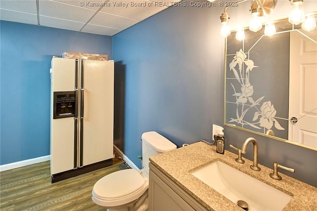 5301 Balsam Cir, Charleston, WV 25313 - bathroom with vanity, wood finished floors, and a paneled ceiling