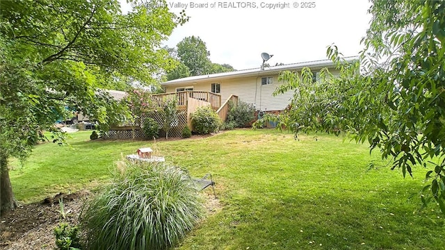 5301 Balsam Cir, Charleston, WV 25313 - view of grassy yard with a deck
