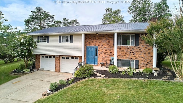 5301 Balsam Cir, Charleston, WV 25313 - bi-level home featuring brick siding, a front lawn, driveway, an attached garage, and a chimney