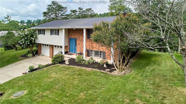 5301 Balsam Cir, Charleston, WV 25313 - raised ranch with brick siding, concrete driveway, a front yard, a garage, and a metal roof