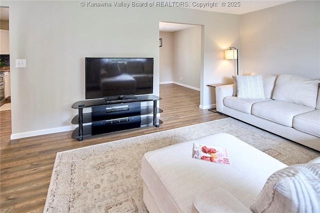 5301 Balsam Cir, Charleston, WV 25313 - living room with baseboards and wood finished floors
