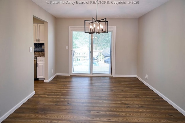 5301 Balsam Cir, Charleston, WV 25313 - unfurnished dining area with dark wood-type flooring and a chandelier
