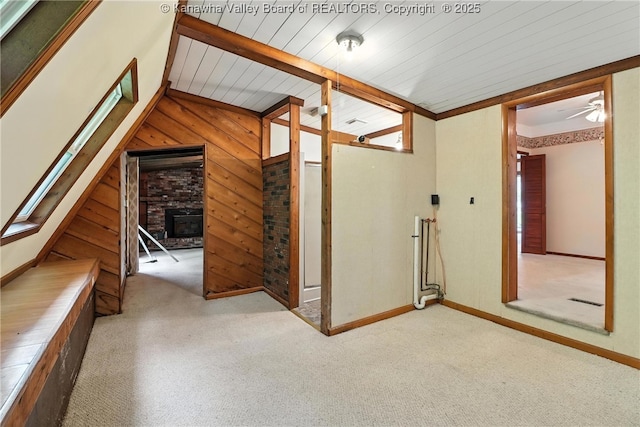3223 Georges Dr, Saint Albans, WV 25177 - additional living space featuring carpet floors, wood walls, a wood ceiling with exposed beams, and a ceiling fan