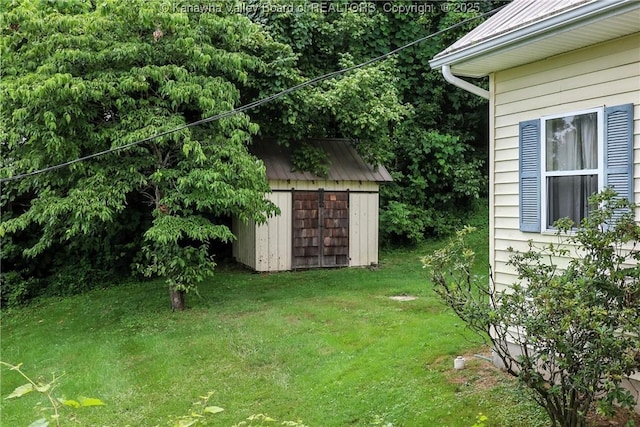 3223 Georges Dr, Saint Albans, WV 25177 - view of grassy yard featuring a storage unit