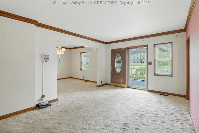 3223 Georges Dr, Saint Albans, WV 25177 - entryway featuring crown molding, a chandelier, and light carpet