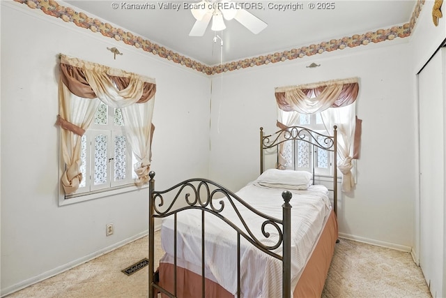 3223 Georges Dr, Saint Albans, WV 25177 - bedroom with light colored carpet, a closet, and a ceiling fan